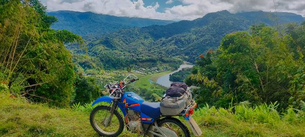 Bike overlooking village and river valley